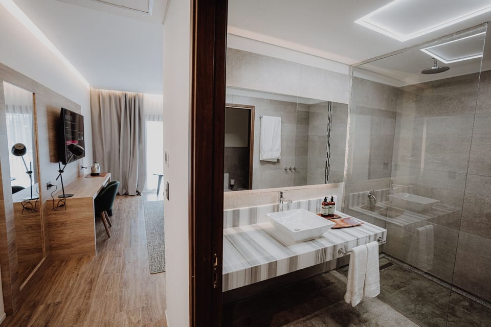 Refresh in a spacious glass shower with bright, spa-like finishes.