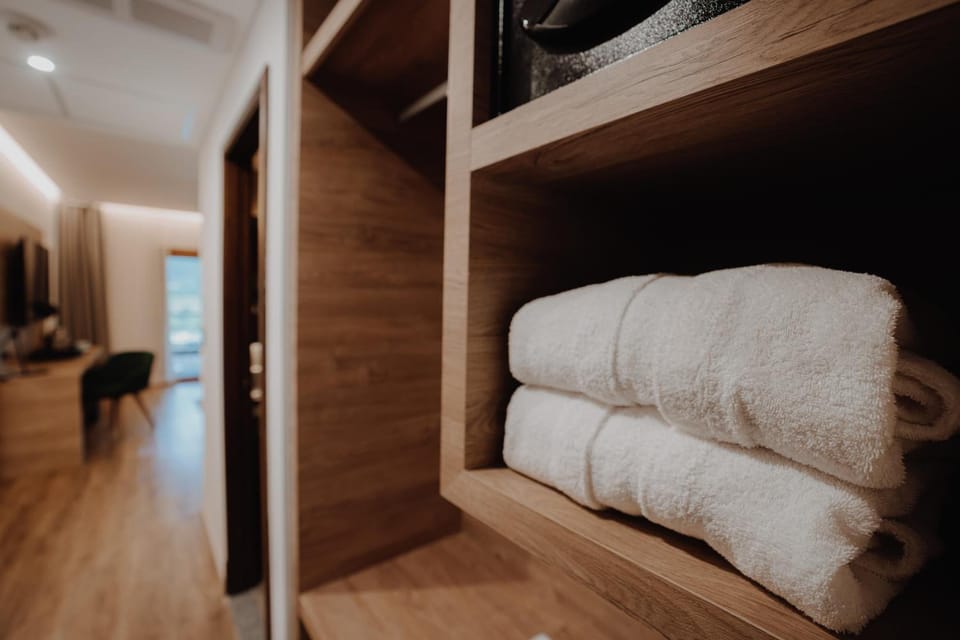 Freshen up after adventures with fluffy towels always within reach.