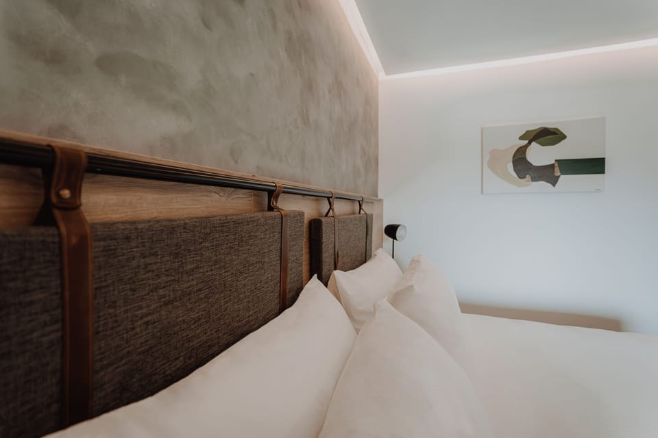 Sink into crisp linens and drift off in quiet comfort.