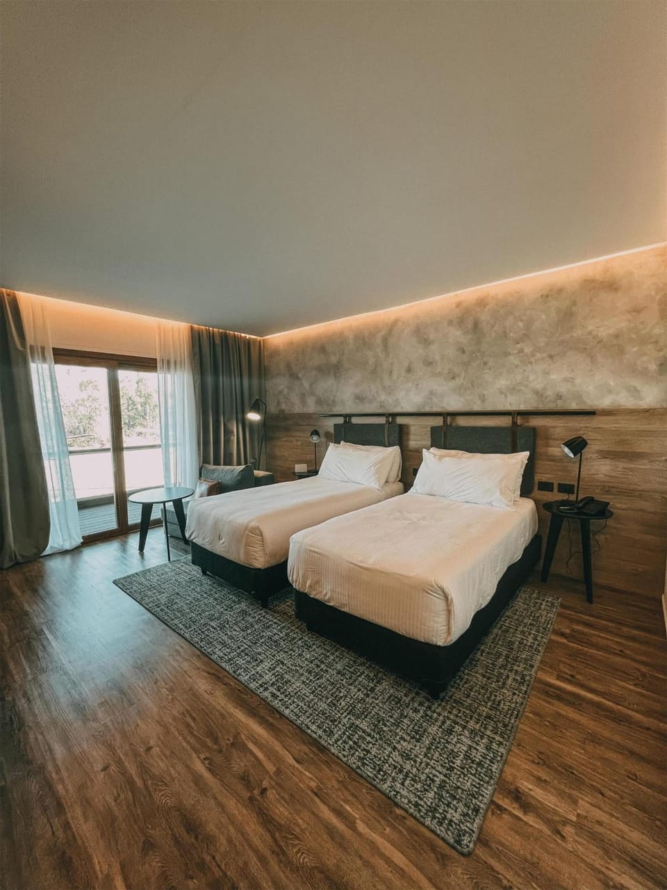 Wake up refreshed in a sunlit room with airy balcony views.