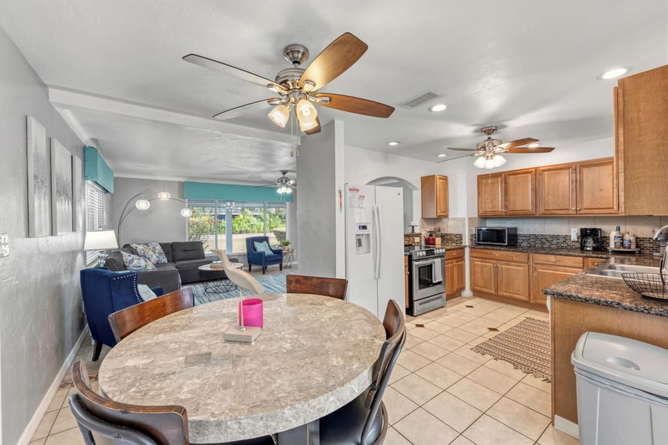 The open floor plan offers comfortable seating and space for the whole group to relax.