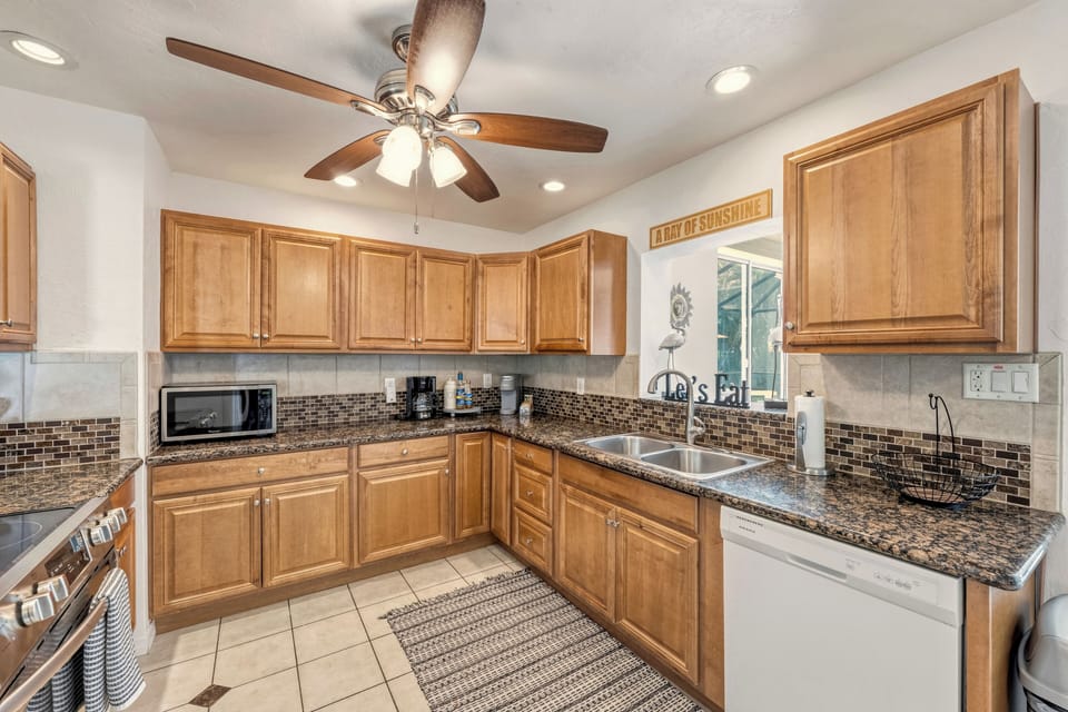 A fully equipped kitchen with generous counter space for preparing meals and snacks.