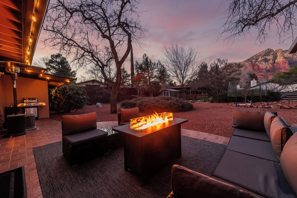 Cozy fire pit lounge with stunning red rock views