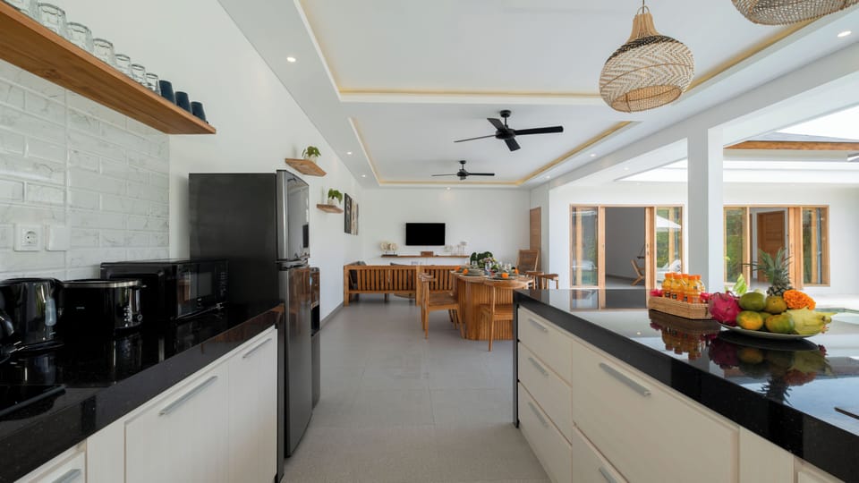 Villa, Pool View | Private kitchen | Fridge, microwave, stovetop, coffee/tea maker
