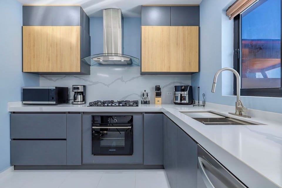 Experience the joy of cooking in our fully equipped kitchen. From your first cup of coffee to a gourmet dinner, this space features high-end appliances and ample counter space to make meal prep a breeze.