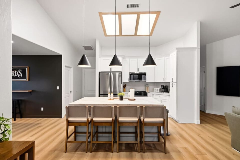 Skylight in the kitchen. Additional seating for 4 at the island