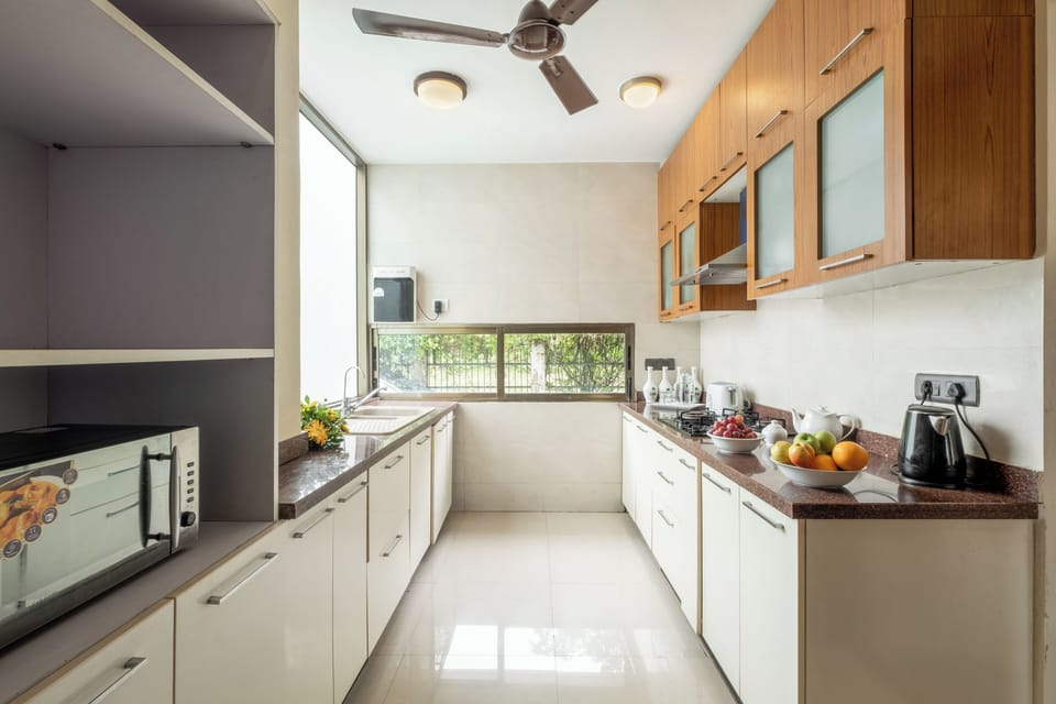 Villa, Balcony, Beach View | Private kitchen | Electric kettle, dining tables