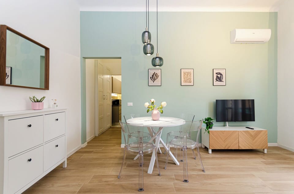 Apartment, City View | Living area | 40-inch Smart TV with digital channels