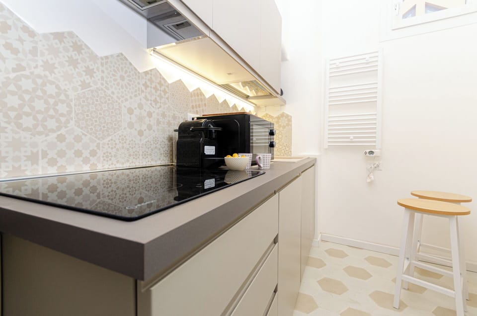 Apartment, City View | Private kitchen | Full-size fridge, microwave, oven, stovetop