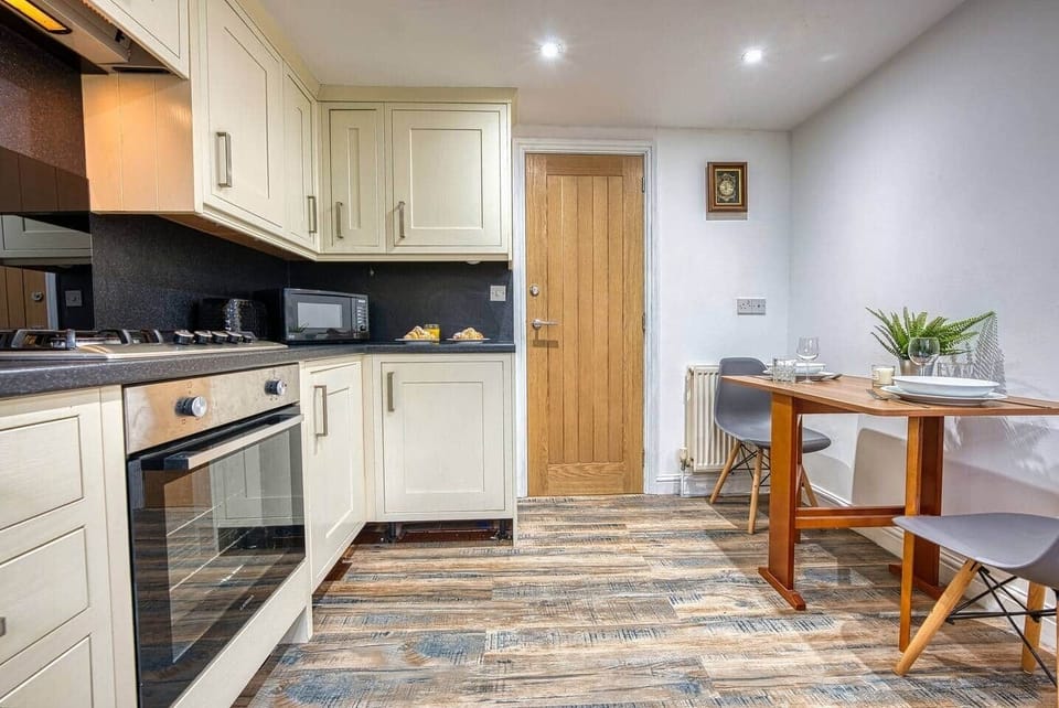 Kitchen with small dining table perfect for morning coffee and home-made meals