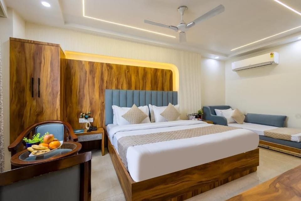 Triple Room, City View | In-room safe, soundproofing, iron/ironing board, free WiFi