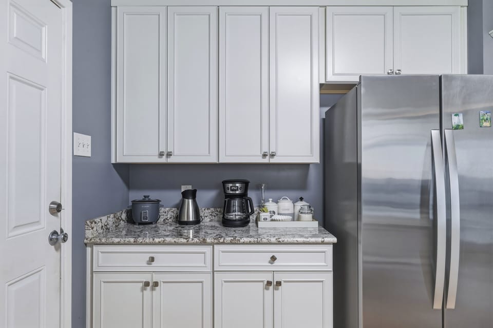 Stainless steel appliances. Fridge does NOT dispense water or ice.