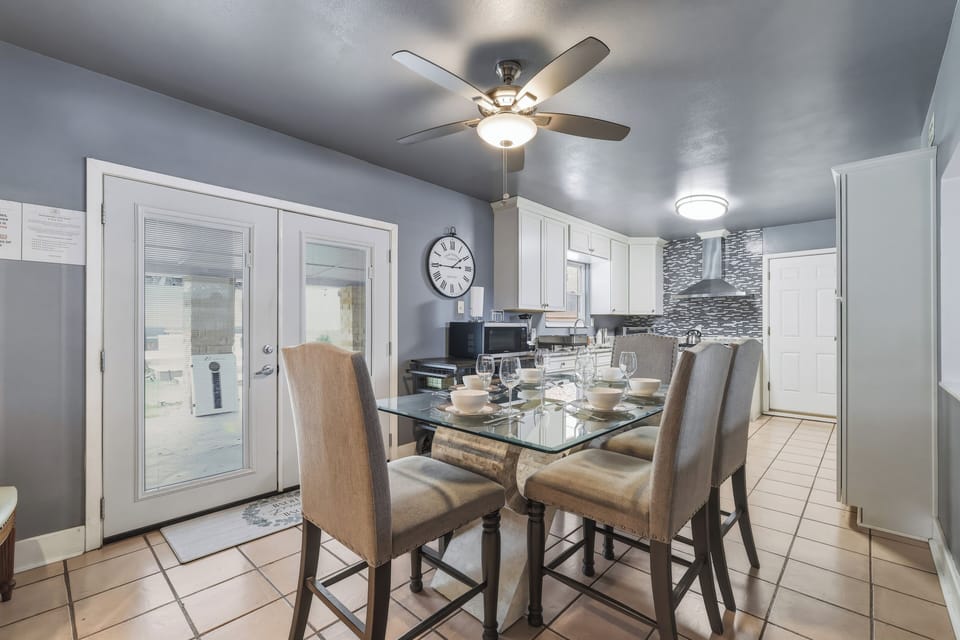 Spacious main dining table that sits 6 with full tableware and silverware included.