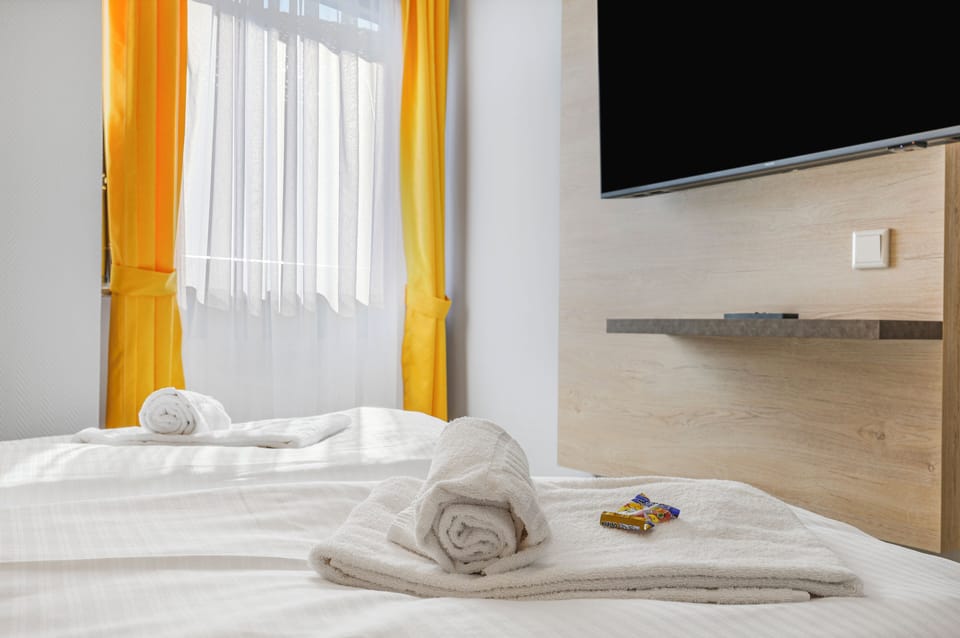 Deluxe Double Room, City View | In-room safe, desk, laptop workspace, blackout drapes