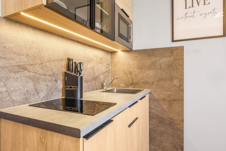 Exclusive Double Room, City View | Private kitchen | Fridge, espresso maker, coffee/tea maker, electric kettle