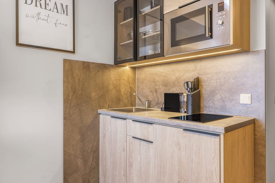 Deluxe Single Room, City View | Private kitchen | Fridge, espresso maker, coffee/tea maker, electric kettle