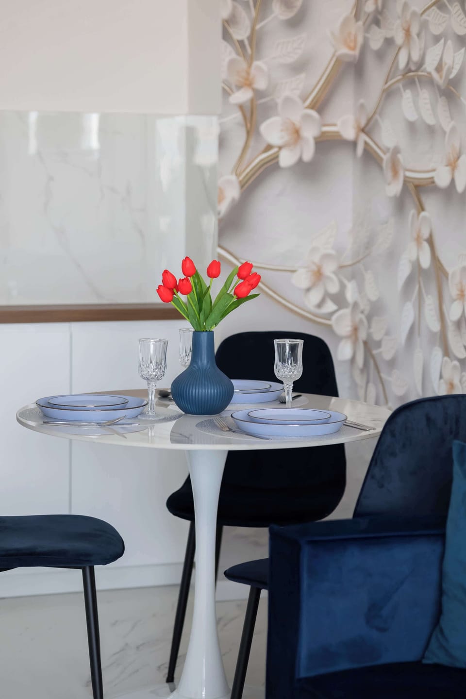 A close-up shot captures the cozy dining setting.