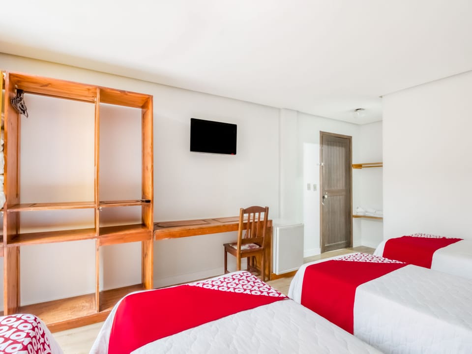 Economy Quadruple Room, Multiple Beds | Minibar, desk, iron/ironing board, free WiFi