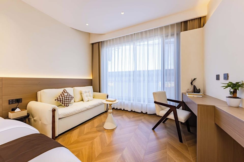 Superior Double Room, Courtyard View | Minibar, desk, laptop workspace, blackout drapes