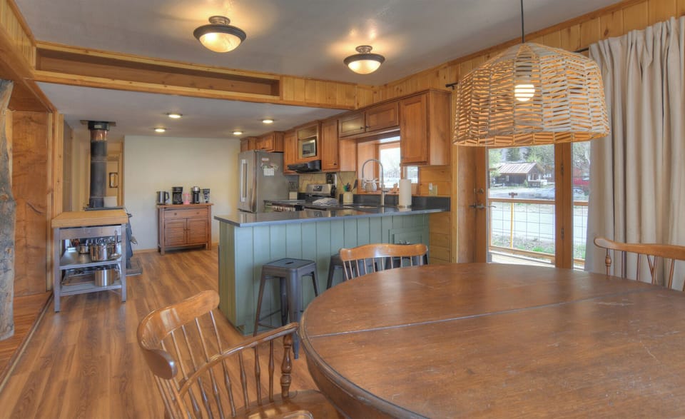 Cobbler's Claim - Open dining, kitchen and living room.
