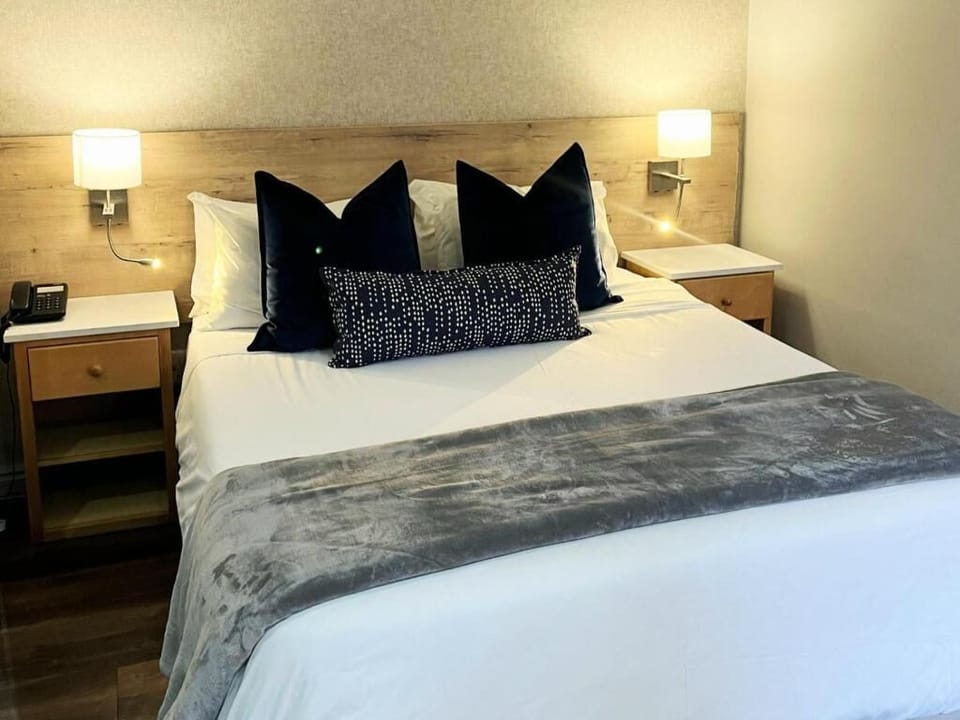Luxury Double Room, Patio, Partial Ocean View | In-room safe, desk, blackout drapes, iron/ironing board