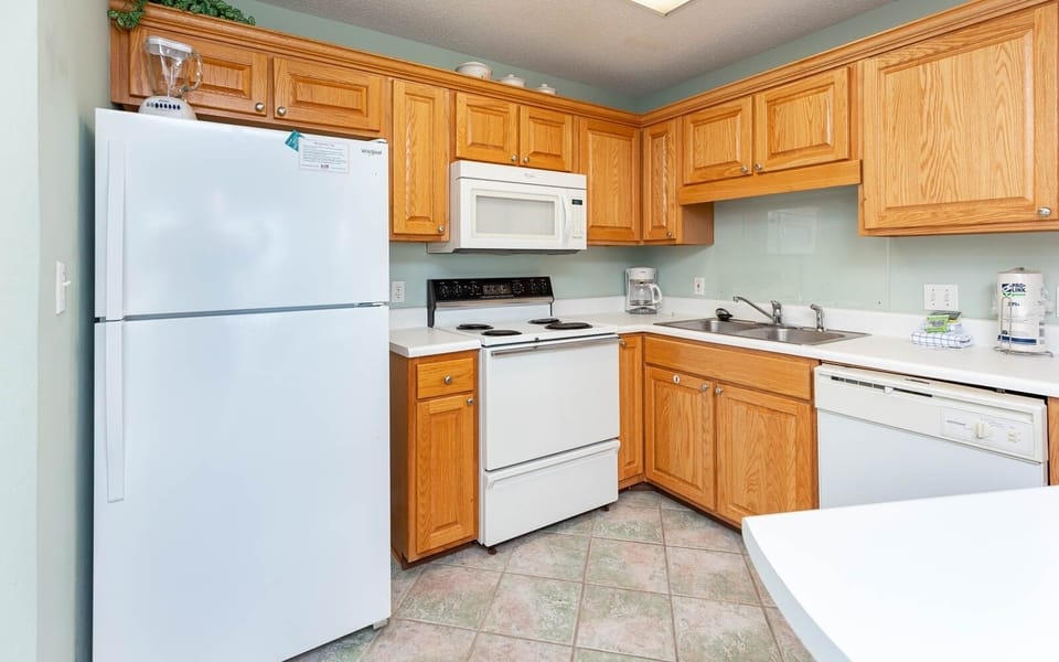 Condo, 2 Bedrooms | Private kitchen | Coffee/tea maker, fridge, oven