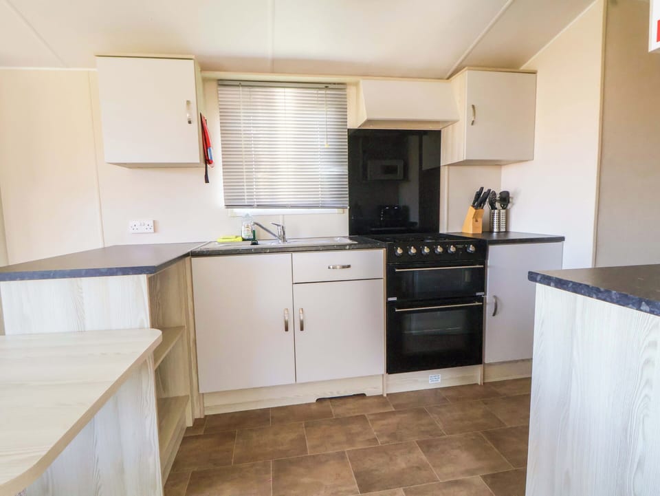 Fridge, microwave, toaster, cookware/dishes/utensils