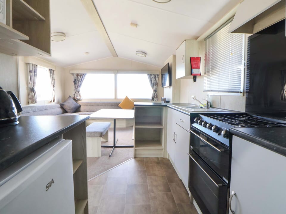 Fridge, microwave, toaster, cookware/dishes/utensils