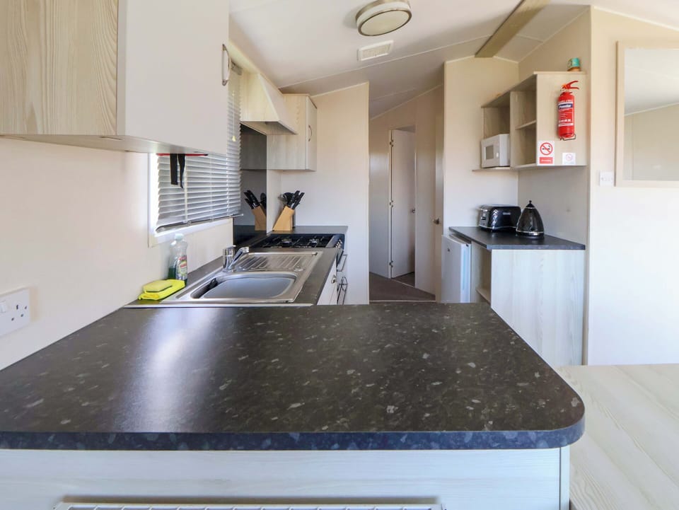 Fridge, microwave, toaster, cookware/dishes/utensils