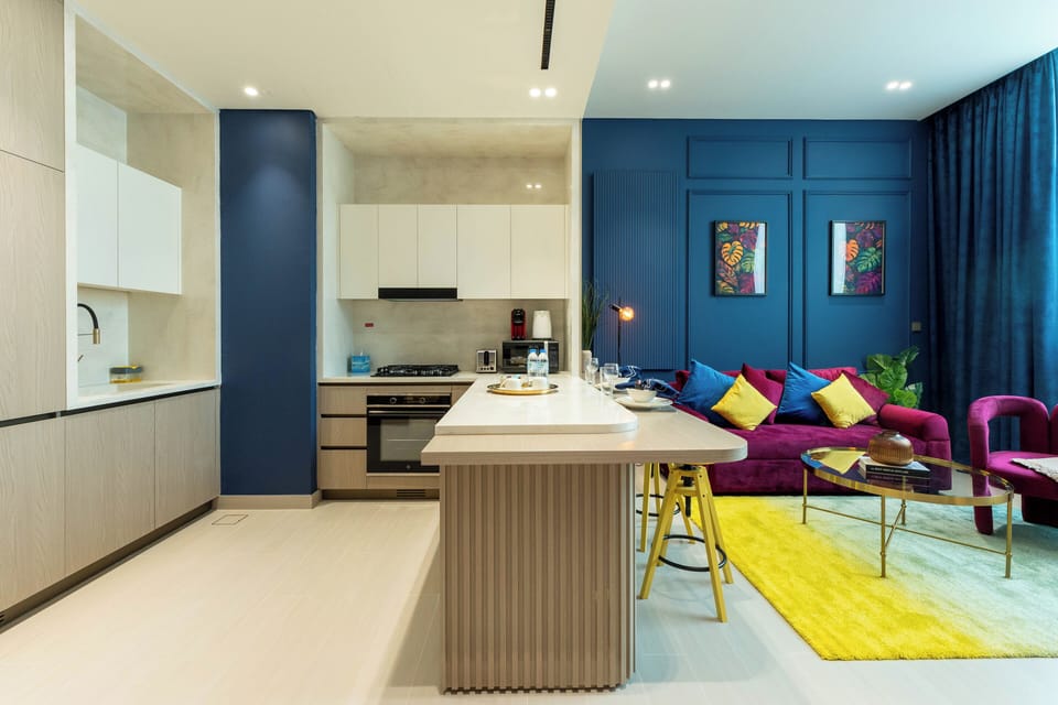 Deluxe Apartment, 1 Bedroom | Living area | 65-inch Smart TV with digital channels, Netflix, streaming services