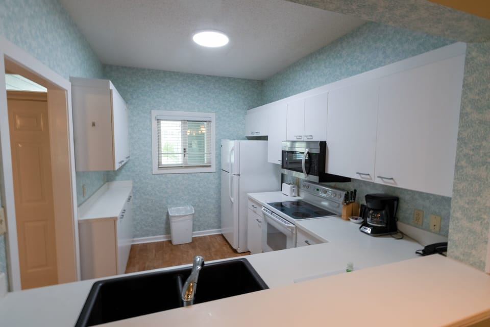 Condo, 2 Bedrooms | Private kitchen | Coffee/tea maker, fridge, oven, toaster