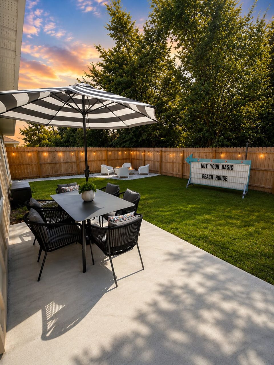 Dive into backyard bliss—where bright murals, a retro marquee glow, crackling fires, alfresco feasts, and our quirky outdoor bowling alley turn every moment into pure vacation fun!