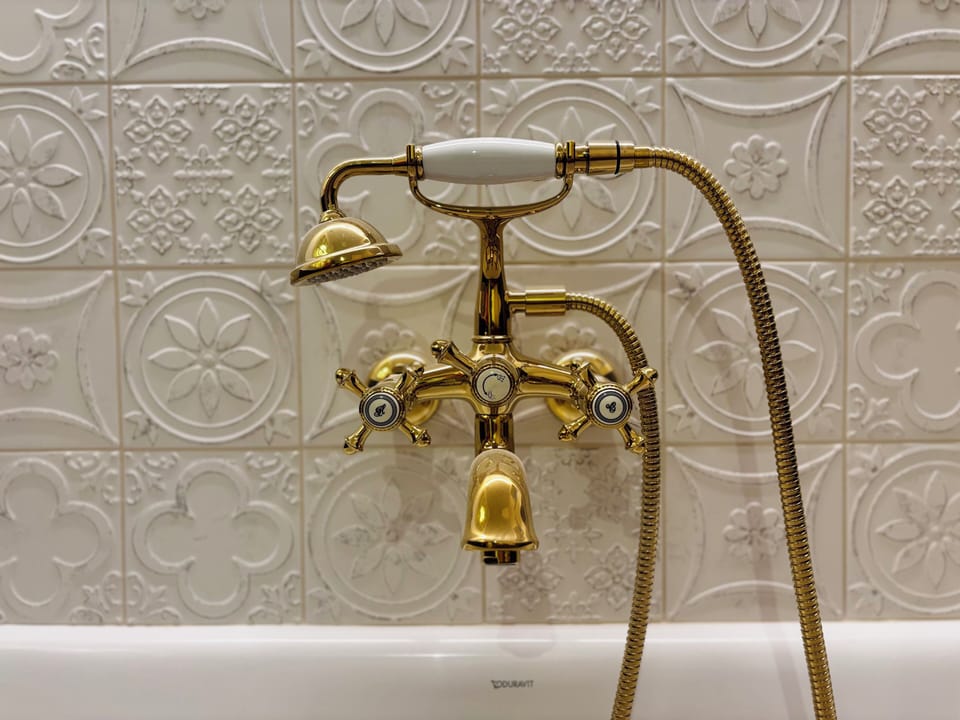 Superior Suite, Garden View | Hand-held showerhead