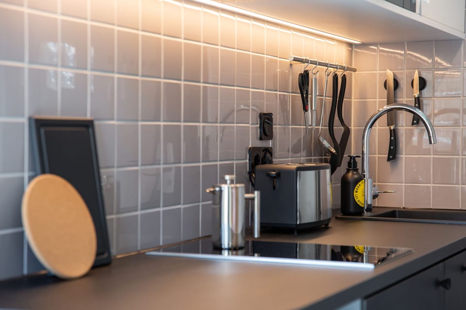 Design Apartment | Desk, laptop workspace, blackout drapes, soundproofing