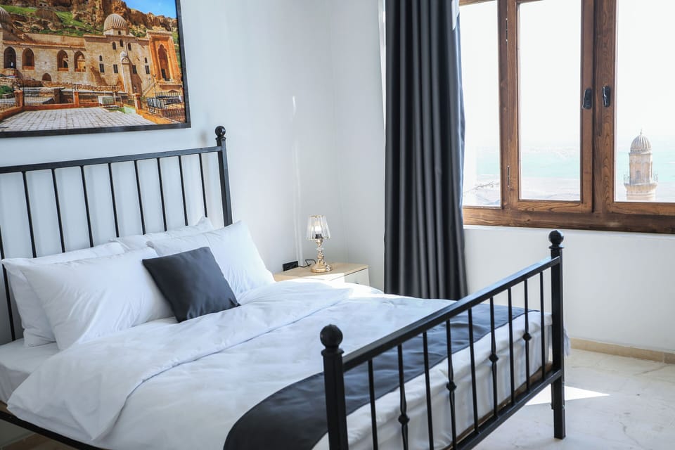 Deluxe Double Room, Balcony, City View | In-room safe, desk, laptop workspace, iron/ironing board