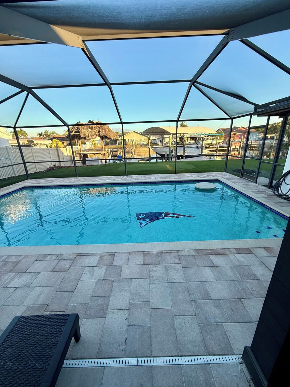 Dive into your private oasis beneath the screened lanai, where sparkling waters meet waterfront views for the perfect Florida escape.