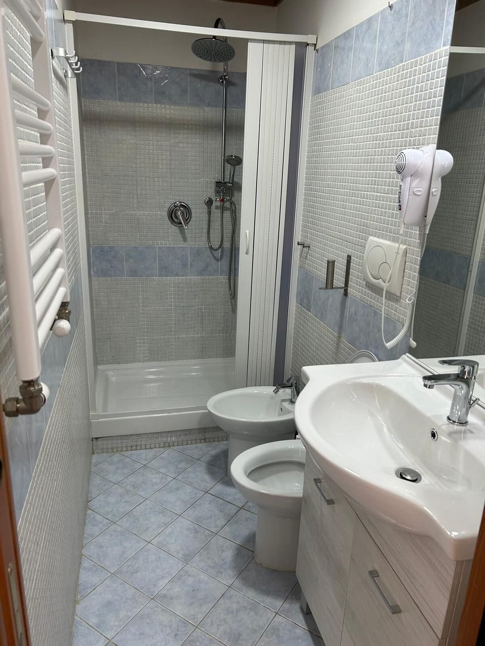 Hair dryer, towels, soap, shampoo