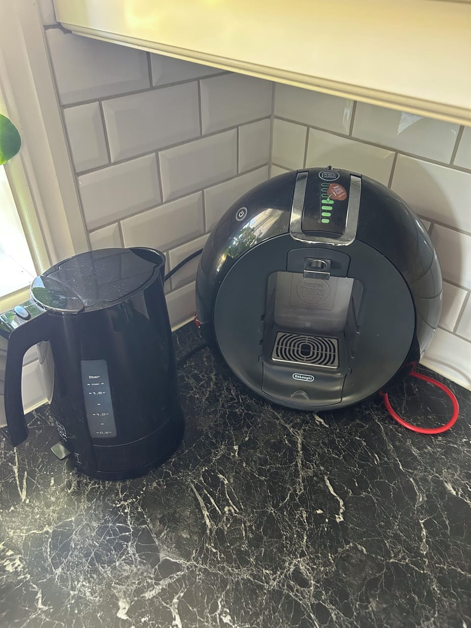 Coffee maker, kettle and Dolce Gusto machine.