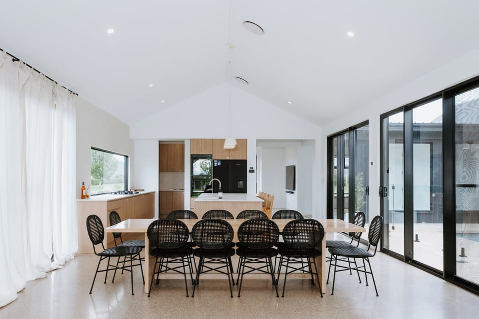 Linger over shared meals at the dining table, designed for long conversations and unhurried evenings.
