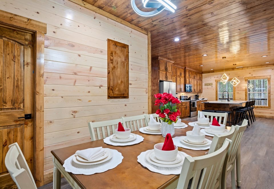 A closer look at the dining area shows a welcoming space where everyone can gather comfortably around the table.