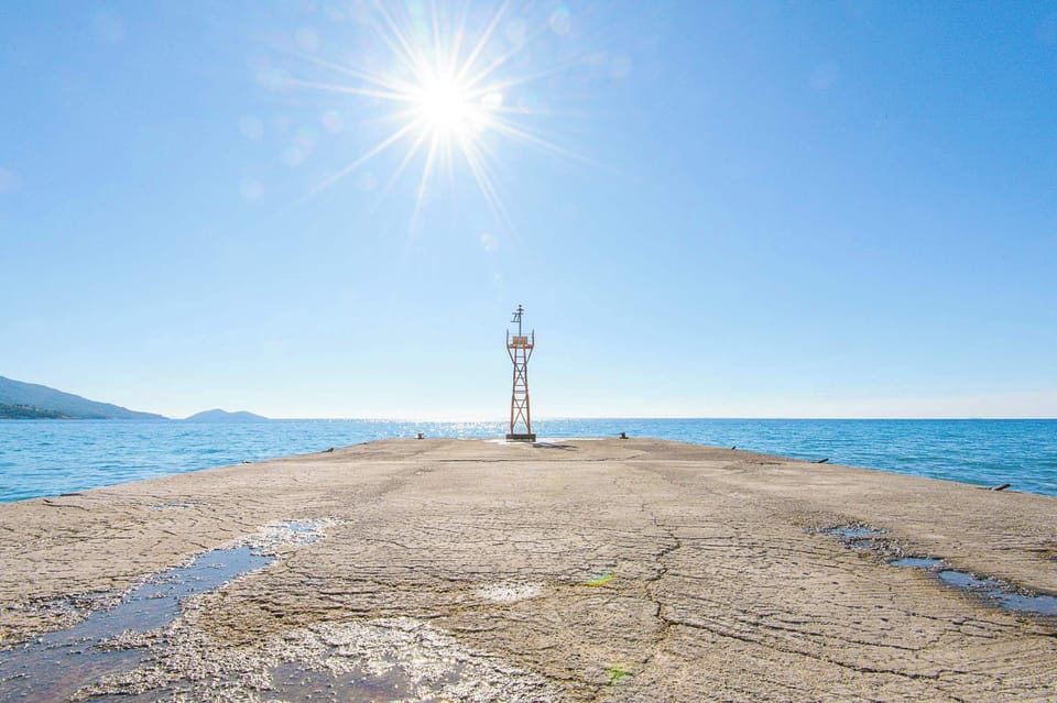 Lighthouse on a Pier just Steps Away