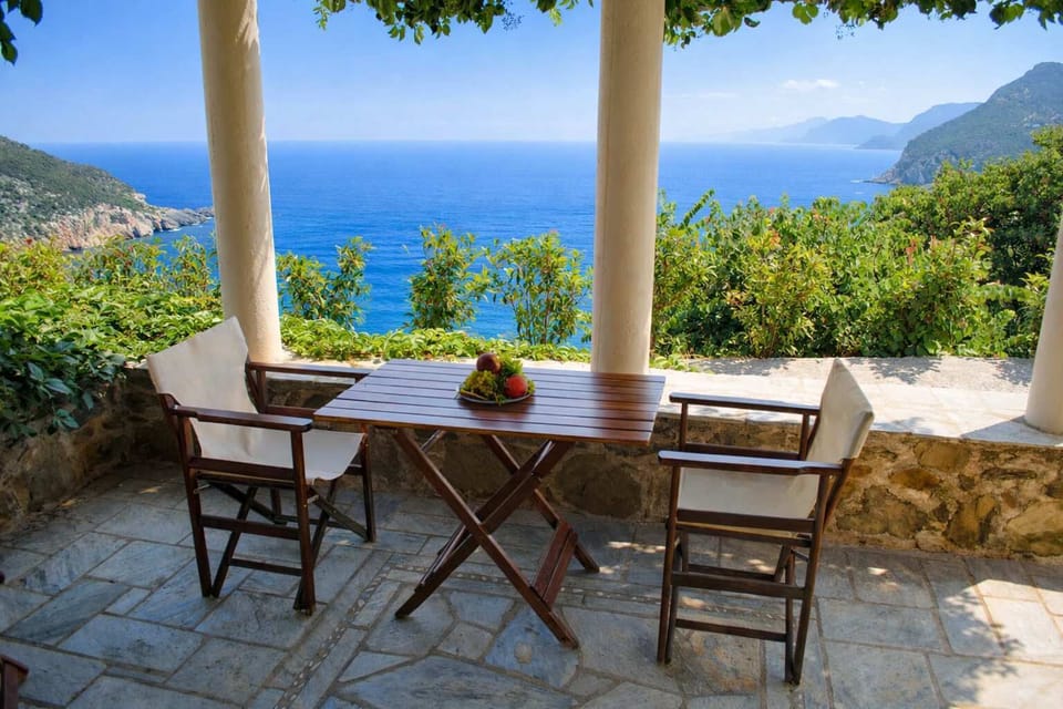 Shaded outdoor lounge for aperitivo hour.