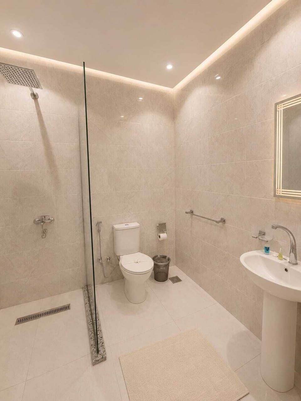 Separate tub and shower, hydromassage showerhead, designer toiletries