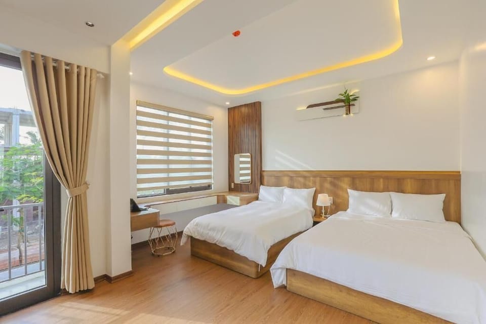 Deluxe Quadruple Room, Balcony, Garden View | Blackout drapes, iron/ironing board, free WiFi