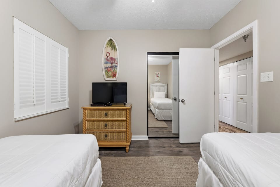 Two twin beds in the second guest bedroom