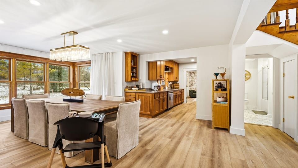 Flowing from the dining room is the coffee station and a fully stocked kitchen.