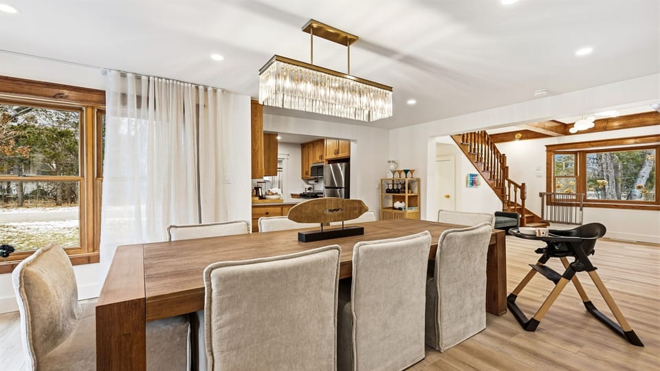 Whether you're enjoying a home-cooked meal or a bottle of wine, this space is designed for both elegance and comfort.