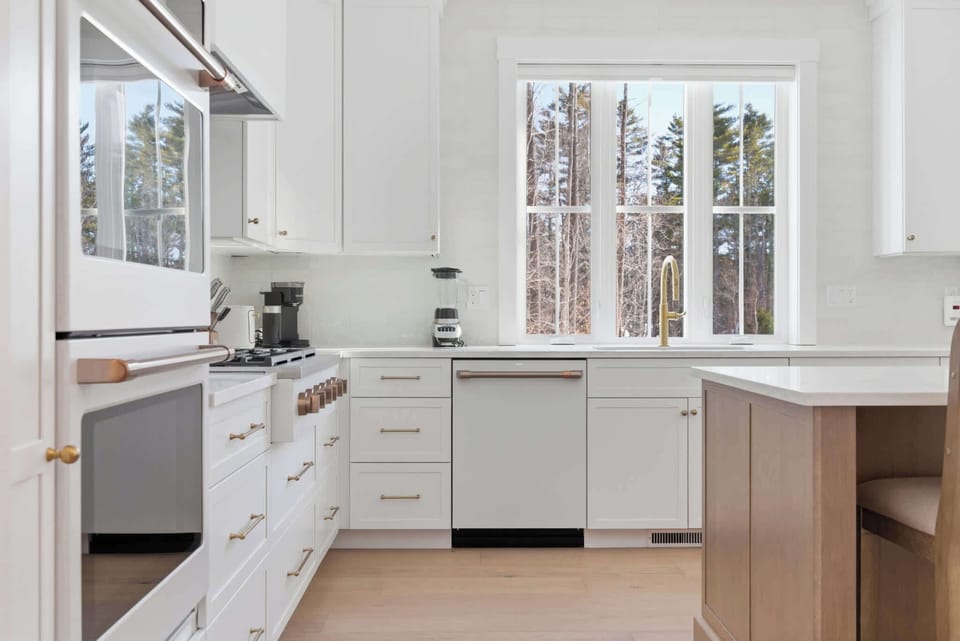 The open kitchen offers ample space & all the comforts of home​