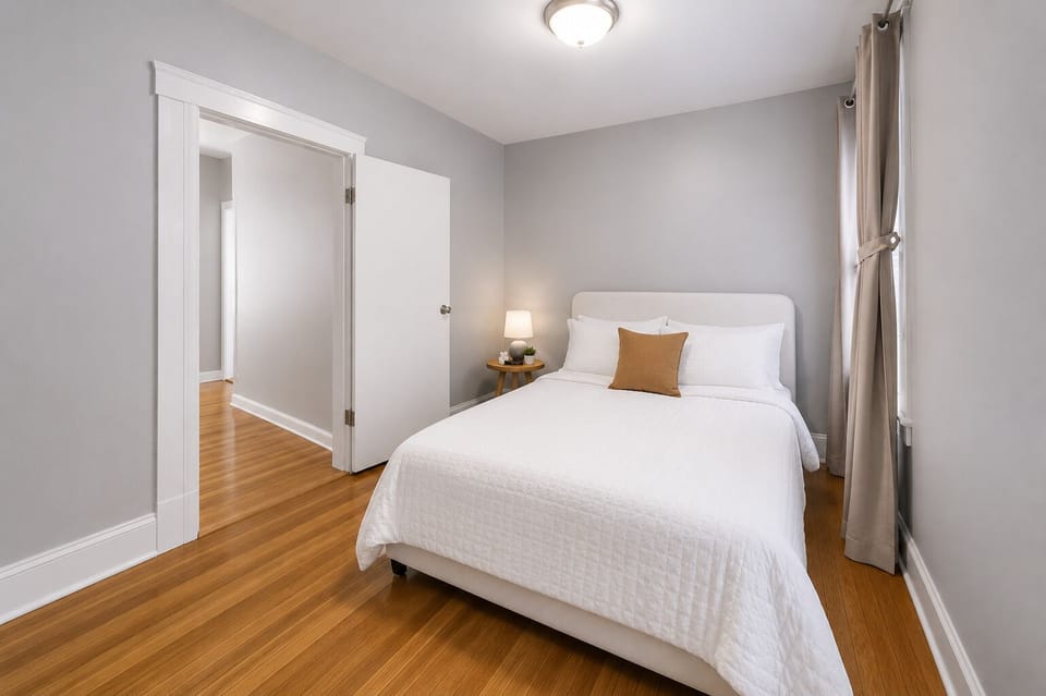 Peaceful bedroom with soft bedding and calm vibe