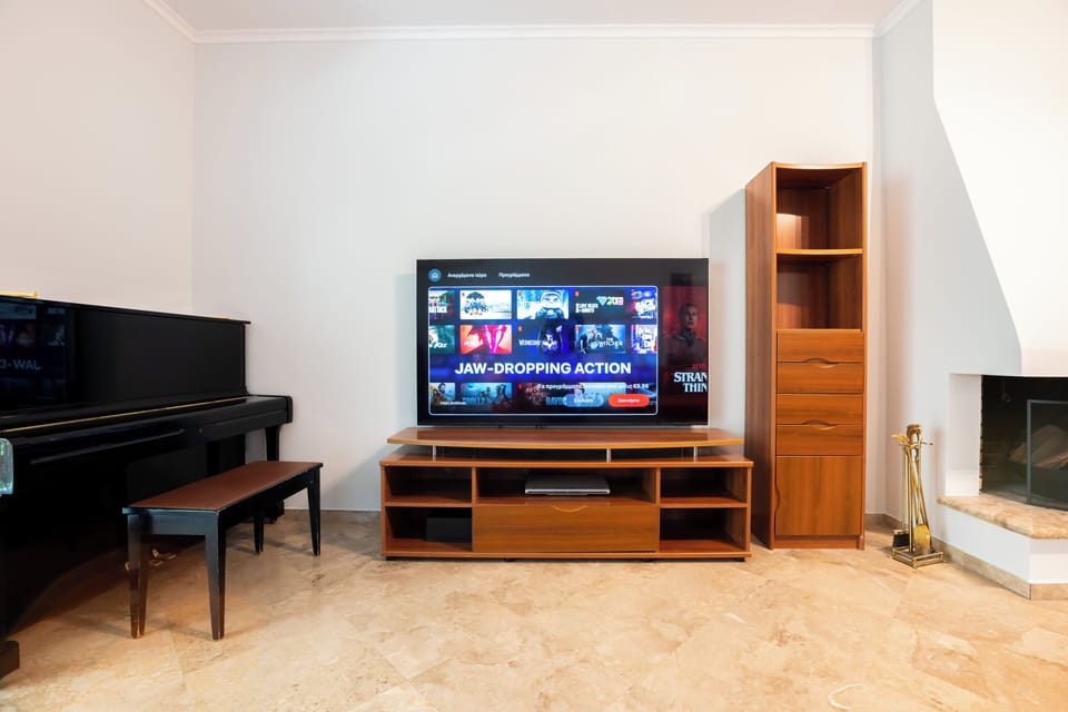 Relax and enjoy your favourite shows in this cosy, stylish living space.
